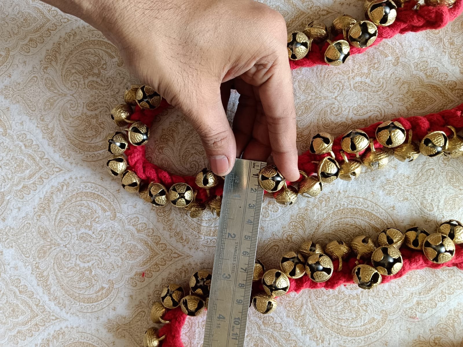 50+50 in red threads bells size 1.8 cms 3